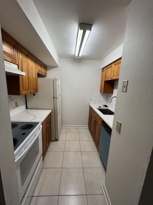 kitchen with dishwasher, white electric range oven, backsplash, light tile patterned floors, and sink