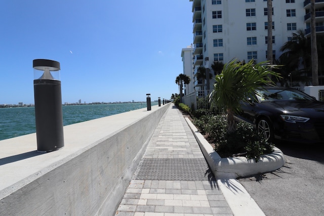 view of home's community featuring a water view