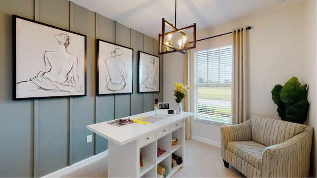 carpeted office space featuring a chandelier