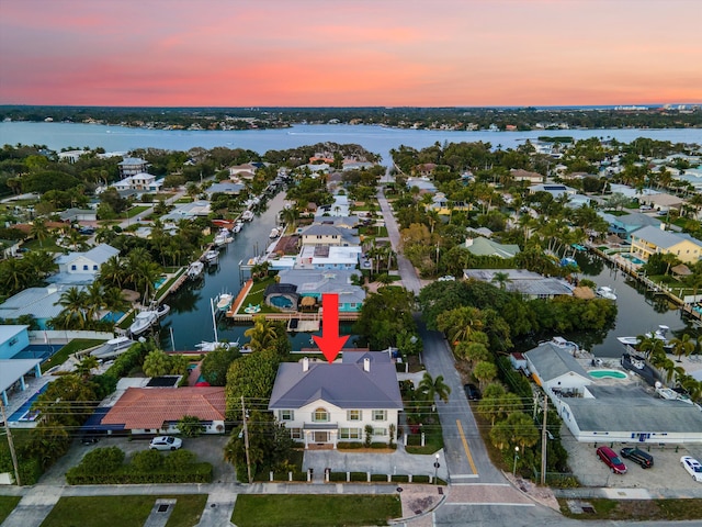 bird's eye view with a water view