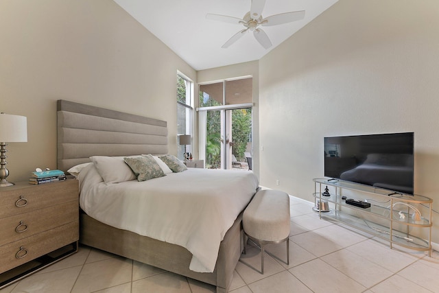 bedroom featuring light tile patterned floors, access to outside, and ceiling fan