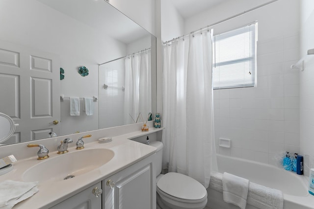 full bathroom featuring vanity, toilet, and shower / bathtub combination with curtain