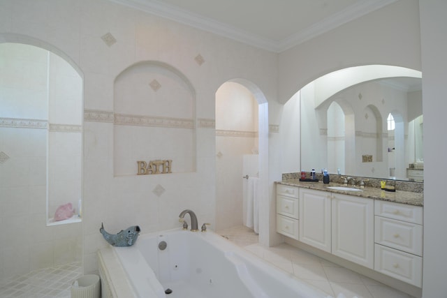 bathroom with tile patterned floors, tile walls, ornamental molding, vanity, and tiled bath