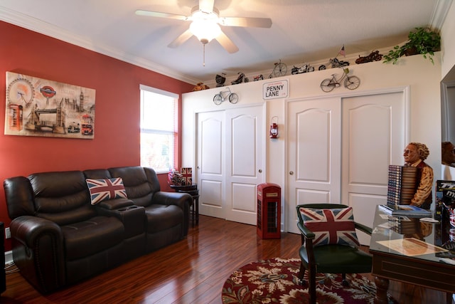 living room with ceiling fan, ornamental molding, and dark hardwood / wood-style flooring