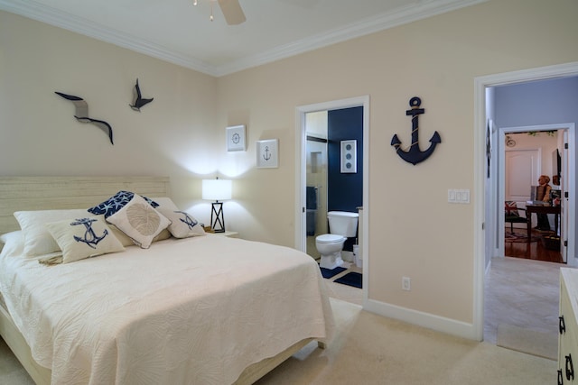 bedroom with ornamental molding, light carpet, and ensuite bathroom