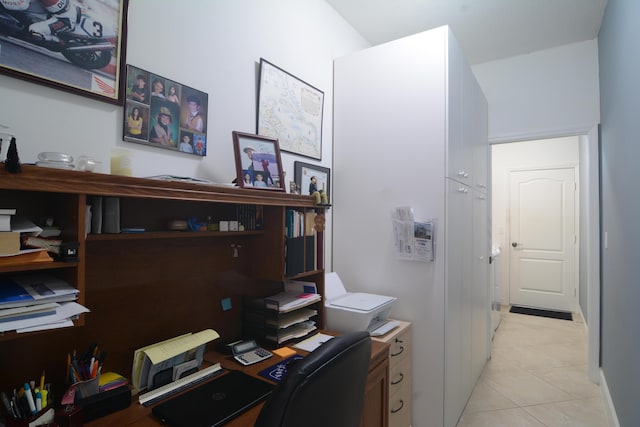 office with light tile patterned flooring