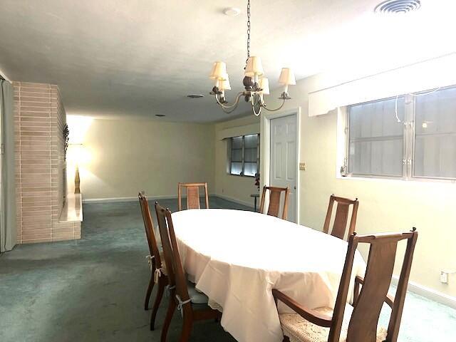 dining room with a chandelier