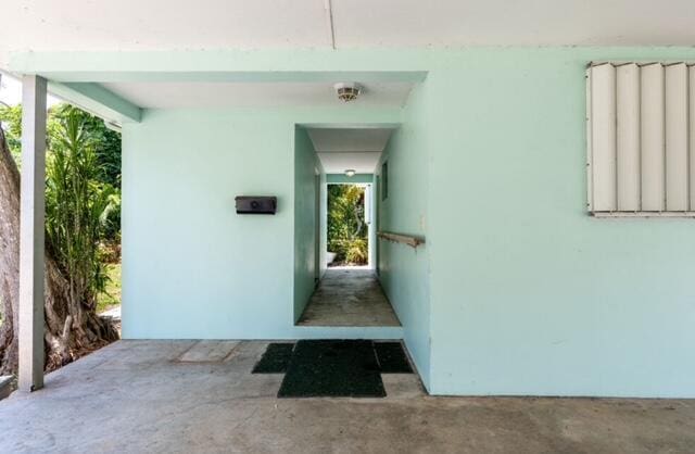 1531 Bacom Point Rd, Pahokee, FL 33476 - doorway to property featuring stucco siding