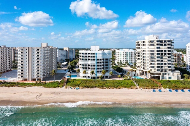 3211 S Ocean Blvd Unit 802, Highland Beach, FL 33487 - view of building exterior featuring view of water and beach