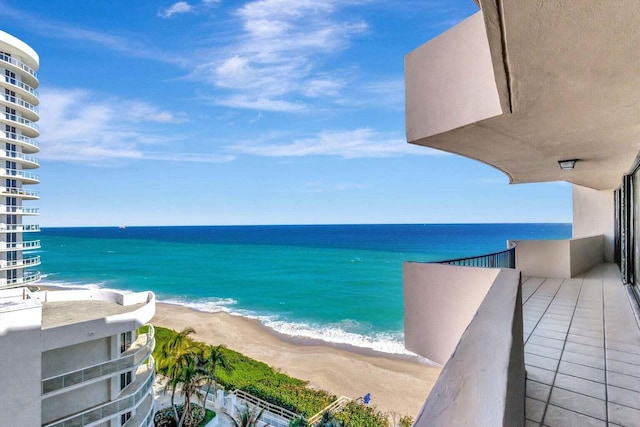 property view of water featuring a beach view