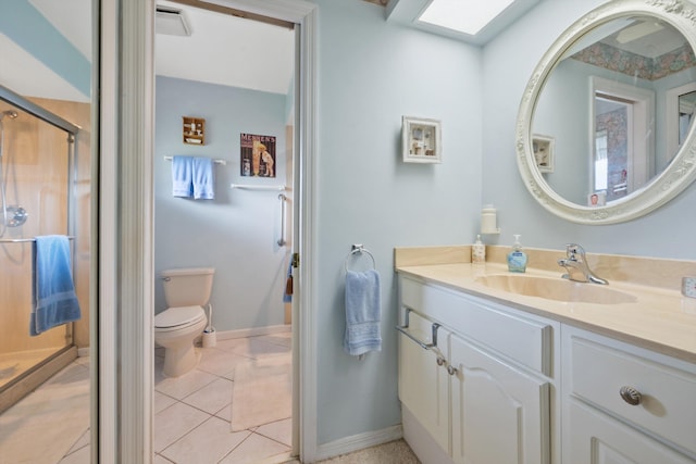 bathroom featuring vanity, baseboards, a skylight, tile patterned floors, and a shower with shower door