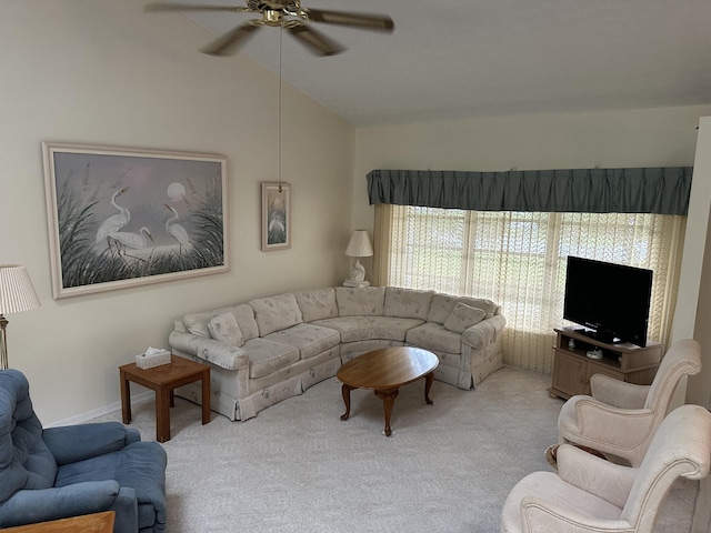 living room featuring vaulted ceiling, light carpet, and ceiling fan