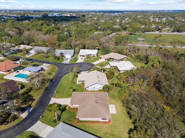 birds eye view of property with a residential view