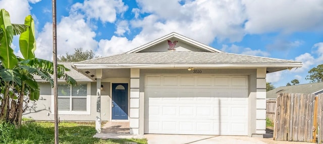 single story home with a garage