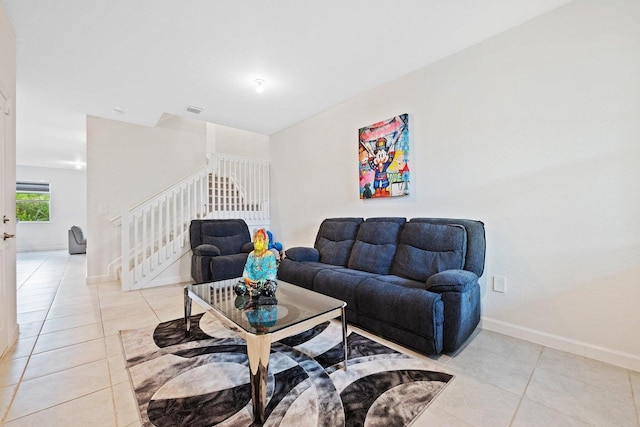 living room with light tile patterned floors