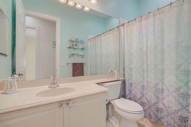 full bathroom featuring curtained shower, vanity, and toilet