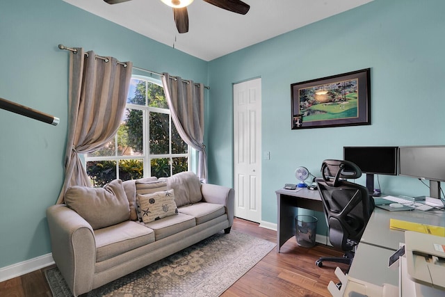 office area with hardwood / wood-style floors and ceiling fan