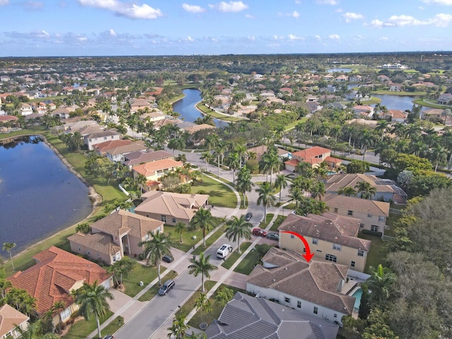 drone / aerial view featuring a water view