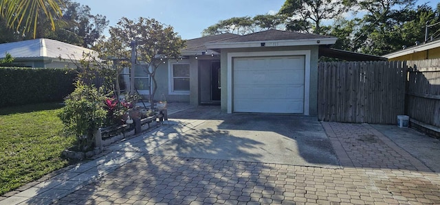 view of front of home featuring a garage