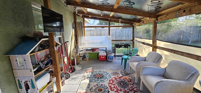 sunroom / solarium with lofted ceiling