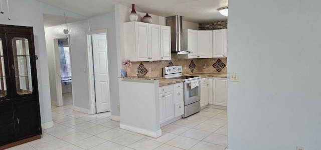 kitchen with light tile patterned floors, backsplash, white cabinets, electric stove, and wall chimney range hood