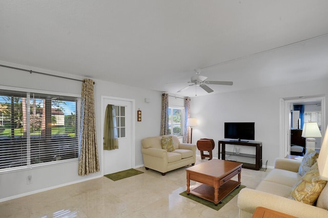 living room featuring ceiling fan