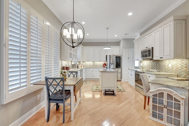 6718 Jog Palm Dr, Boynton Beach, FL 33437 - kitchen featuring appliances with stainless steel finishes, backsplash, white cabinets, light wood-type flooring, and recessed lighting