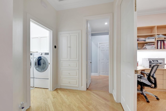 6718 Jog Palm Dr, Boynton Beach, FL 33437 - washroom with light wood-style floors, a desk, ornamental molding, and washing machine and dryer