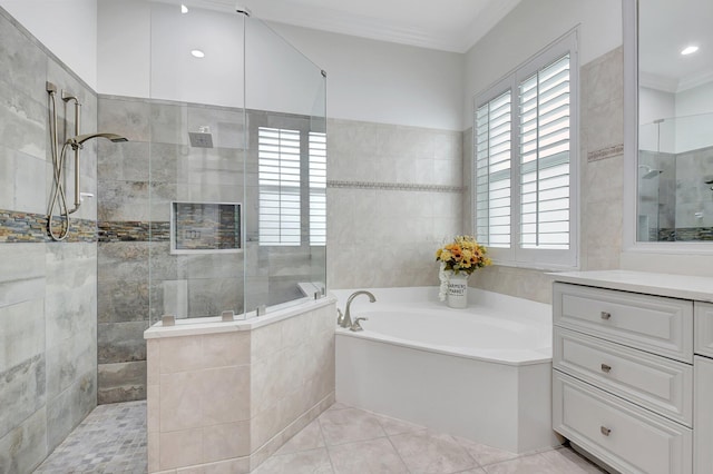 6718 Jog Palm Dr, Boynton Beach, FL 33437 - full bathroom featuring tile walls, a walk in shower, a bath, ornamental molding, and tile patterned flooring