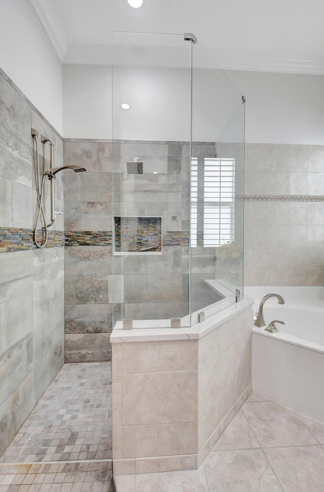 6718 Jog Palm Dr, Boynton Beach, FL 33437 - bathroom with crown molding, a walk in shower, a garden tub, and tile patterned flooring
