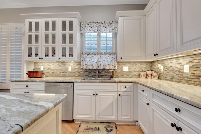 6718 Jog Palm Dr, Boynton Beach, FL 33437 - kitchen with dishwasher, a sink, backsplash, and white cabinets