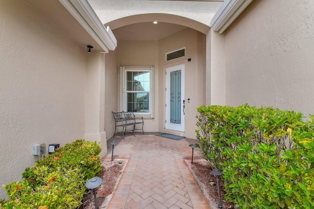 6718 Jog Palm Dr, Boynton Beach, FL 33437 - doorway to property featuring stucco siding