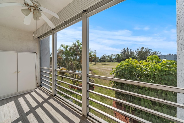 balcony featuring ceiling fan