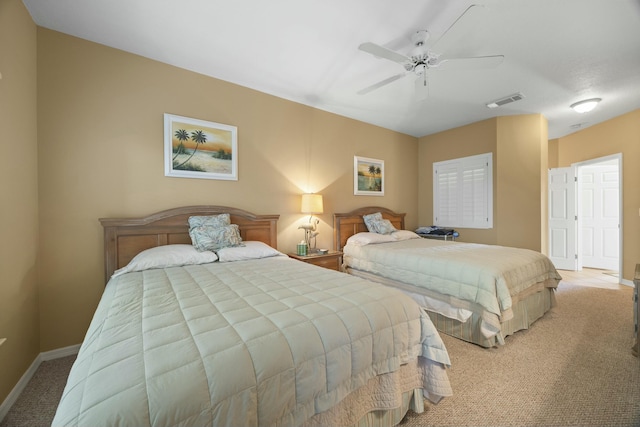 bedroom with light carpet and ceiling fan