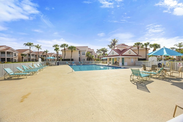 view of swimming pool featuring a patio area