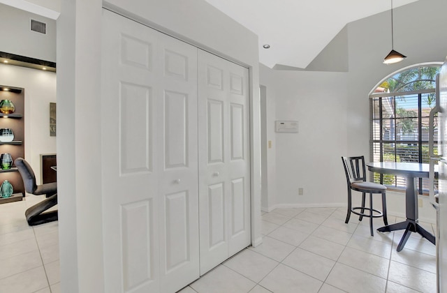 dining space featuring light tile patterned floors