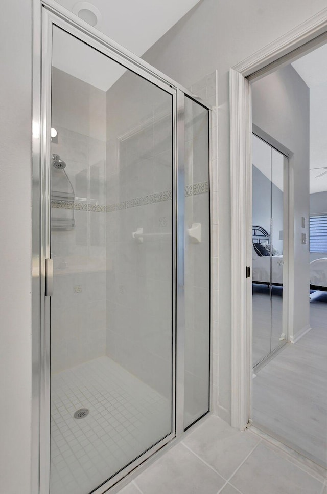 21117 Via Solano, Boca Raton, FL 33433 - ensuite bathroom with a shower stall, tile patterned flooring, and connected bathroom