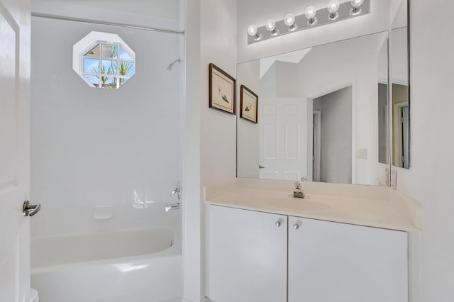 bathroom with vanity and shower / bathing tub combination