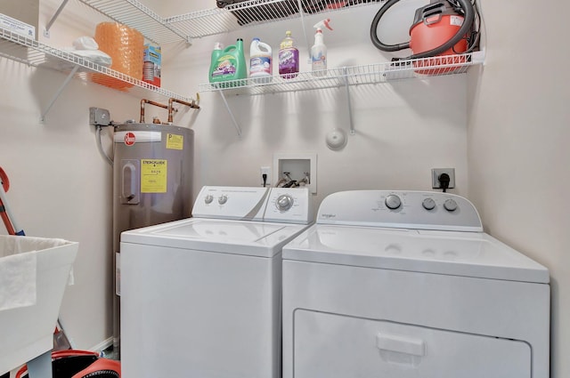 21117 Via Solano, Boca Raton, FL 33433 - washroom featuring washing machine and dryer, electric water heater, a sink, and laundry area