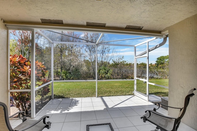 unfurnished sunroom featuring plenty of natural light