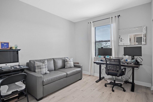 office area with light wood-type flooring