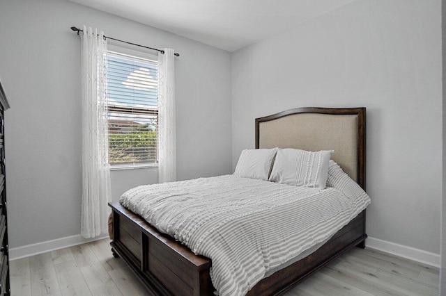 bedroom featuring light wood-type flooring