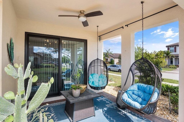 view of patio with ceiling fan