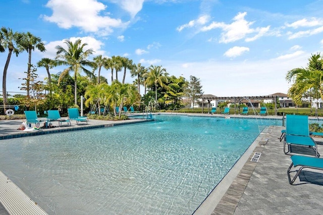 view of pool with pool water feature