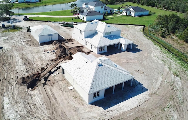 drone / aerial view with a water view