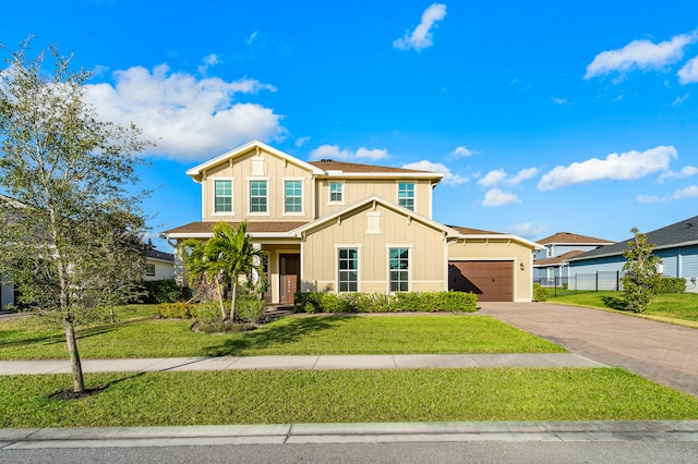 view of front facade featuring a garage and a front yard