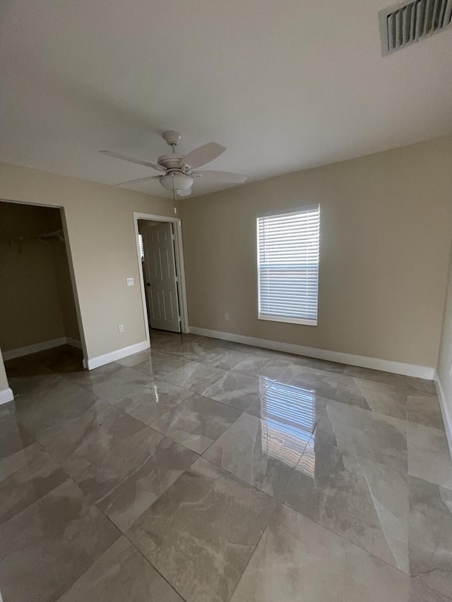 spare room featuring ceiling fan