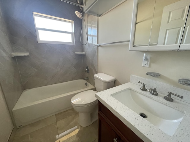 full bathroom with tiled shower / bath combo, vanity, tile patterned floors, and toilet