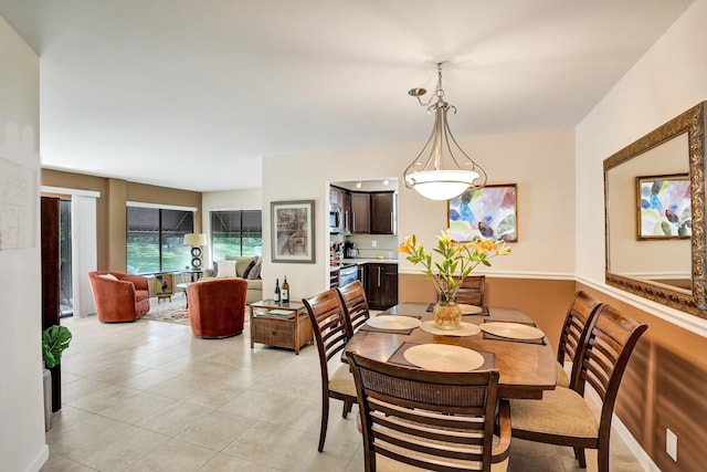 dining space with light tile patterned flooring