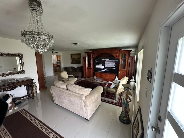 living room featuring a notable chandelier